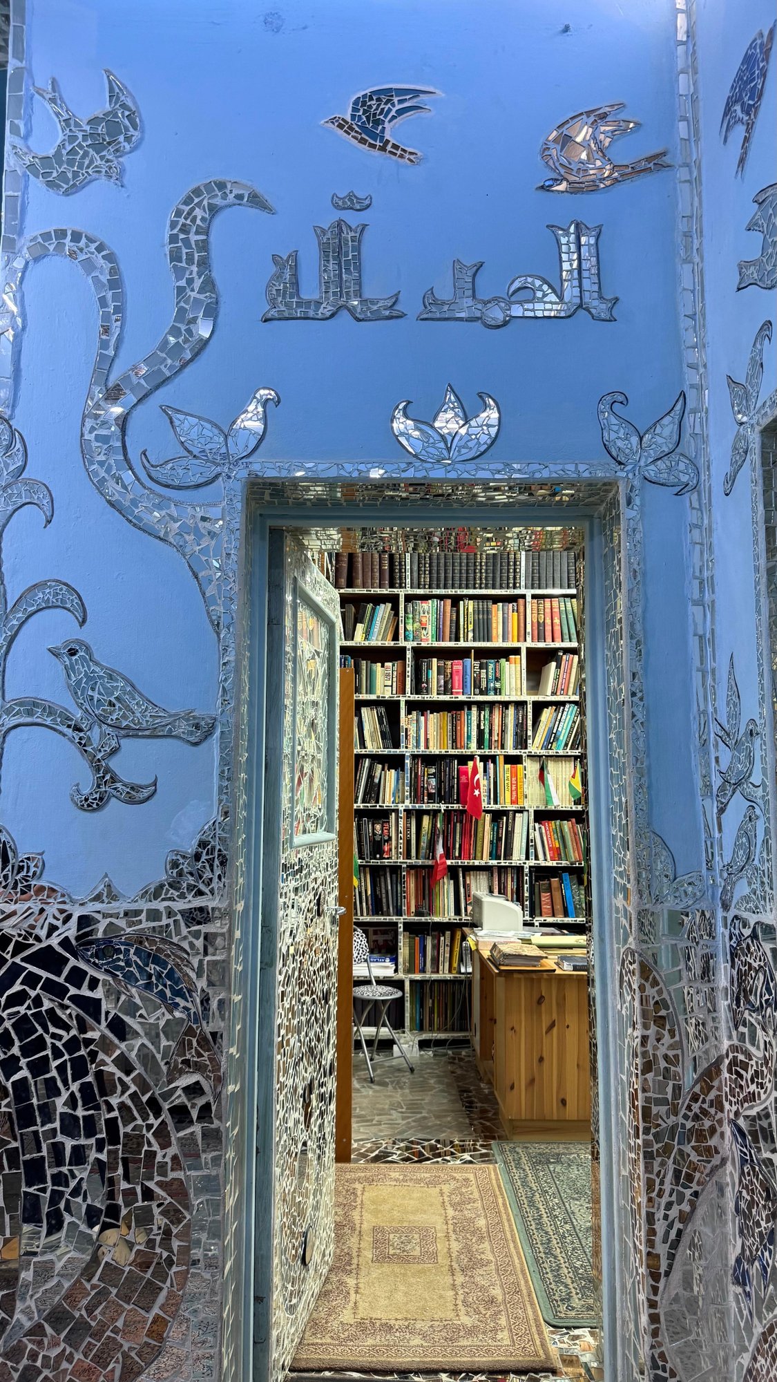 A doorway into the book-lined library